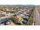 Aerial view of house, pool, and surrounding neighborhood at 44020 N 50Th Ln, New River, AZ 85087