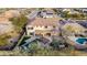 Aerial view showcasing house, pool, and pergola at 44020 N 50Th Ln, New River, AZ 85087