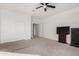 Spacious bedroom with double door closet and carpeted floor at 44020 N 50Th Ln, New River, AZ 85087