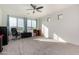 Bedroom with mountain views and carpeted floor at 44020 N 50Th Ln, New River, AZ 85087