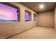 Covered patio with stunning sunset views at 44020 N 50Th Ln, New River, AZ 85087