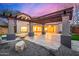 Expansive patio with pergola, pool, and elegant stonework at 44020 N 50Th Ln, New River, AZ 85087