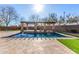 Relaxing pool area with pergola and fountain feature at 44020 N 50Th Ln, New River, AZ 85087