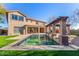 Inviting swimming pool with a water feature in the backyard at 44020 N 50Th Ln, New River, AZ 85087