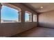 Private balcony with arched windows and scenic views at 44020 N 50Th Ln, New River, AZ 85087