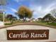 Carrillo Ranch community sign with lush green landscape and clear blue sky at 4760 W Tulsa St, Chandler, AZ 85226