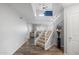 Inviting foyer with staircase, hardwood floors, and neutral walls that complement the design at 4760 W Tulsa St, Chandler, AZ 85226