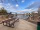 Picturesque picnic tables by the serene lake at Desert Breeze Park at 4760 W Tulsa St, Chandler, AZ 85226