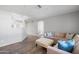 Spacious living room featuring modern wood-look floors, neutral walls, and recessed lighting at 4760 W Tulsa St, Chandler, AZ 85226