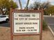 Welcome sign to the city of Chandler Desert Breeze Park with park hours listed on the sign at 4760 W Tulsa St, Chandler, AZ 85226