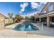 Backyard oasis with refreshing pool, patio area, and lush greenery, perfect for outdoor relaxation at 4760 W Tulsa St, Chandler, AZ 85226