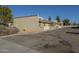 Exterior view of a light beige building with parking at 5115 N 22Nd Ave # 1, Phoenix, AZ 85015