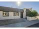 Front exterior view of a light beige house at 5115 N 22Nd Ave # 1, Phoenix, AZ 85015