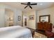 Bedroom with wooden dresser and en-suite bathroom access at 5133 N 34Th Pl, Phoenix, AZ 85018