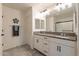 Double vanity bathroom with granite countertops at 5172 E Desert Forest Trl, Cave Creek, AZ 85331