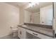 Bathroom with granite countertop and white cabinets at 5172 E Desert Forest Trl, Cave Creek, AZ 85331