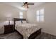 Cozy bedroom with double bed and wood floors at 5172 E Desert Forest Trl, Cave Creek, AZ 85331