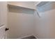 Simple white closet with shelves at 5172 E Desert Forest Trl, Cave Creek, AZ 85331