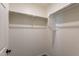 White built-in closet with hanging rod and shelf at 5172 E Desert Forest Trl, Cave Creek, AZ 85331