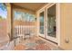 Covered patio with two chairs and patterned rug at 5172 E Desert Forest Trl, Cave Creek, AZ 85331