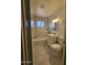 Updated bathroom with white vanity and marble-look tile at 5222 S 13Th Way, Phoenix, AZ 85040