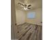 Spacious bedroom featuring a ceiling fan and vinyl flooring at 5222 S 13Th Way, Phoenix, AZ 85040