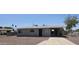 Updated single story home with a carport, fenced yard, and gravel driveway at 5222 S 13Th Way, Phoenix, AZ 85040