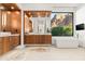 Bathroom featuring dual vanities and soaking tub with a mountain view at 5724 N Echo Canyon Dr, Phoenix, AZ 85018