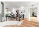 Bright foyer with wood floors, iron railings, and an open floor plan that leads to the dining room at 5724 N Echo Canyon Dr, Phoenix, AZ 85018