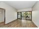 Living room with sliding glass doors leading to a balcony at 6125 E Indian School Rd # 218, Scottsdale, AZ 85251