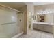 Bathroom with double vanity, shower, and separate tub at 629 E Palo Verde St, Casa Grande, AZ 85122