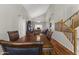 Formal dining room with hardwood floors and access to staircase at 629 E Palo Verde St, Casa Grande, AZ 85122