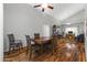 Spacious dining area with hardwood floors and view into adjacent living area at 629 E Palo Verde St, Casa Grande, AZ 85122