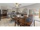 Kitchen with granite countertops and island, and adjacent dining area at 629 E Palo Verde St, Casa Grande, AZ 85122