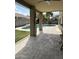 Covered patio with paved floor and view of the fenced backyard and swimming pool at 629 E Palo Verde St, Casa Grande, AZ 85122