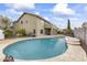 Inviting kidney-shaped pool with a large patio area at 629 E Palo Verde St, Casa Grande, AZ 85122