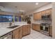 Spacious kitchen featuring a large island and marble countertops at 7073 E Brilliant Sky Dr, Scottsdale, AZ 85266