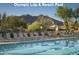 Olympic lap pool and beach entry pool with lounge chairs at 7073 E Brilliant Sky Dr, Scottsdale, AZ 85266