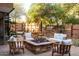 Private patio features fire pit, seating, and outdoor grill at 7117 E Rancho Vista Dr # 1012, Scottsdale, AZ 85251