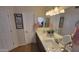 Double vanity bathroom with modern finishes and plenty of storage at 736 E Ivanhoe St, Chandler, AZ 85225