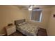 Bedroom with a ceiling fan, dresser, and a comfortable bed at 736 E Ivanhoe St, Chandler, AZ 85225