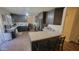 Kitchen with island, dark cabinets, and granite counters at 736 E Ivanhoe St, Chandler, AZ 85225