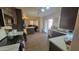 Modern kitchen with dark brown cabinets and white countertops at 736 E Ivanhoe St, Chandler, AZ 85225