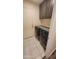 Laundry room with washer, dryer, and upper cabinets at 736 E Ivanhoe St, Chandler, AZ 85225