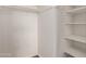 White closet with hanging rod and shelves at 7638 E Northland Dr, Scottsdale, AZ 85251