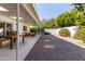 Relaxing patio with lounge chairs and dining table, great for entertaining at 7638 E Northland Dr, Scottsdale, AZ 85251