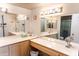 Double vanity bathroom with large mirror and plenty of counter space at 7708 E Park View Dr Dr, Mesa, AZ 85208