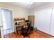 Bedroom with wood flooring, desk, and built-in shelving at 7708 E Park View Dr Dr, Mesa, AZ 85208