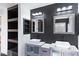 Bathroom with double vanity and dark accents at 8147 W Hilton Ave, Phoenix, AZ 85043