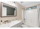 Clean bathroom with white vanity and bathtub at 8147 W Hilton Ave, Phoenix, AZ 85043